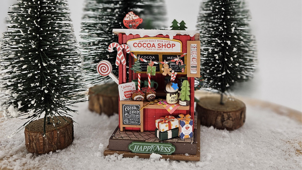 Vier kerst met Monique in een chocoladekraampje en een kerstkamertje, miniaturen van Robotime