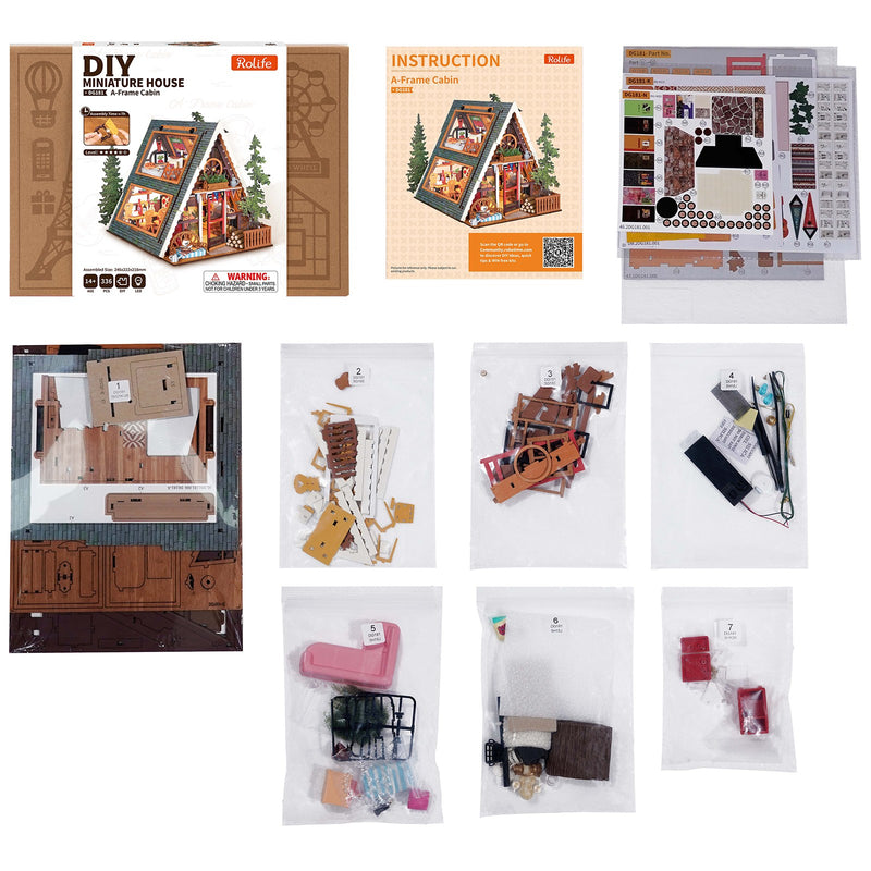 Contents of the package of the Robotime A-Frame Cabin, miniature vacation home in wintery Austrian style