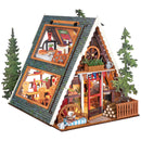 Product photo of the Robotime A-Frame Cabin, miniature vacation home in wintery Austrian style