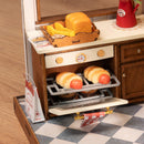 Open oven with bread rolls in the Robotime Baking Kitchen