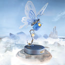 Atmospheric presentation of the Robotime Butterfly (Blue), electric construction kit of a blue butterfly that can flap its wings, on a blue flower
