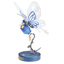 Product photo of the Robotime Butterfly (Blue), electric construction kit of a blue butterfly that can flap its wings, on a blue flower