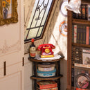 Details of the corner table with the old-fashioned telephone and the bookcase from Robotime Catherine's Living Room