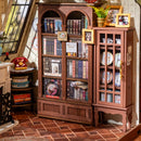 Close-up of the bookcase and china cabinet from Robotime Catherine’s Living Room