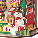 Close-up of the snowman standing in front of the Robotime Christmas Candy Stand