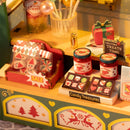 Christmas sweets and treats displayed on the counter of the Robotime Christmas Candy Stand