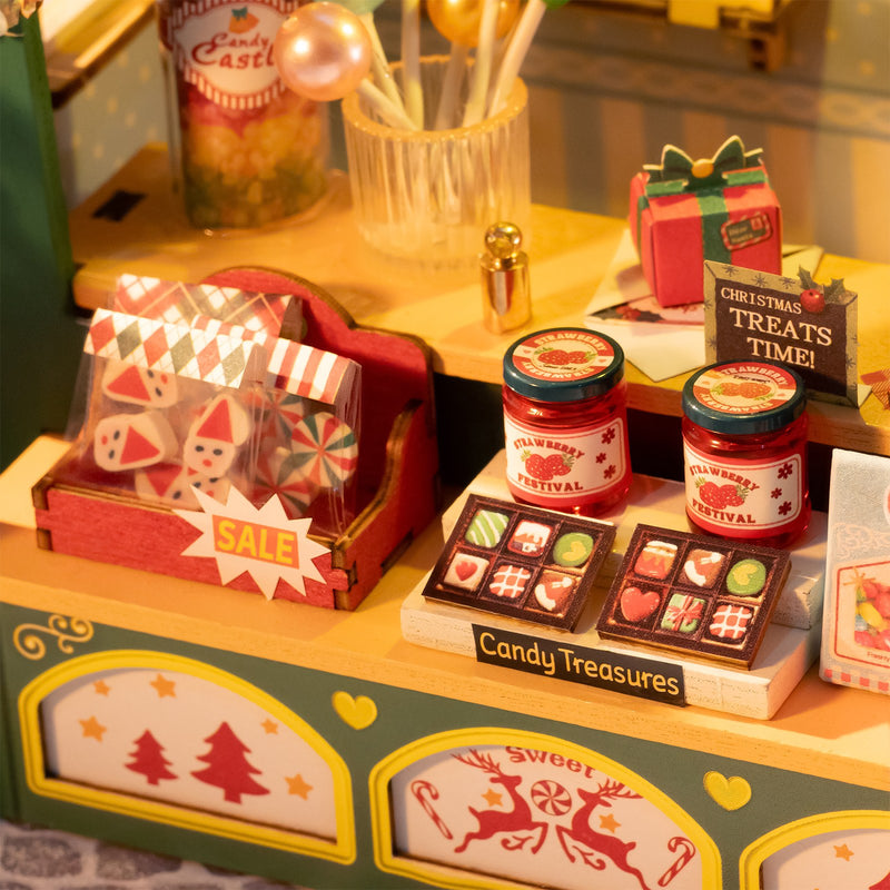 Christmas sweets and treats displayed on the counter of the Robotime Christmas Candy Stand