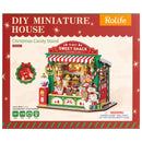 Front of package of the Robotime Christmas Candy Stand, construction set for a miniature candy stand with a Christmas theme