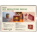 Back of package of the Robotime Christmas Eve Party, diorama of a Christmas themed living room with lights