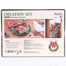 Back of package of the Robotime Christmas Wreath, wooden construction set of a Christmas wreath
