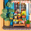 Flowers and plants displayed in front of the store in the Robotime Daily Fresh Flower