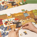 A person is making the Robotime Doggie Art Gallery