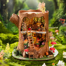 Atmospheric presentation of the Robotime Fairytale Tree House, construction kit for a miniature two-story house in a hollow tree trunk