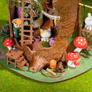 The bottom of the stump with mushrooms around it and the ground floor of the Robotime Fairytale Tree House