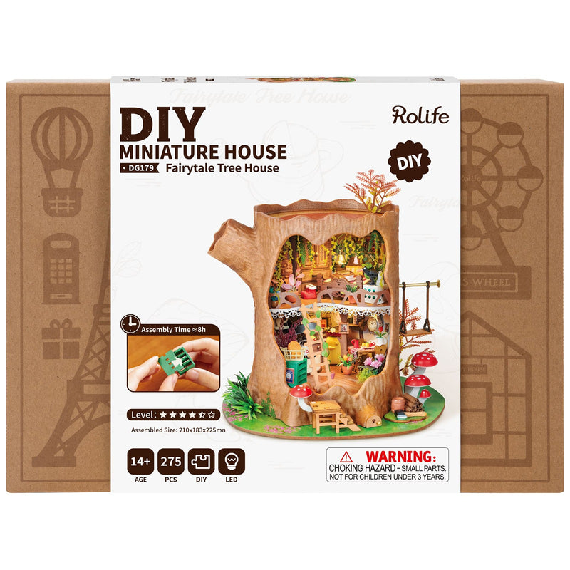 Front of package of the Robotime Fairytale Tree House, construction kit for a miniature two-story house in a hollow tree trunk
