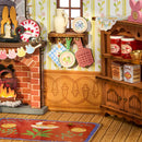 Fireplace, wall shelf, and cabinet in the Robotime Fluffy Grove