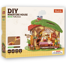 Front of package of the Robotime Fluffy Grove, building kit for a fairy-tale-like miniature house with a nature theme