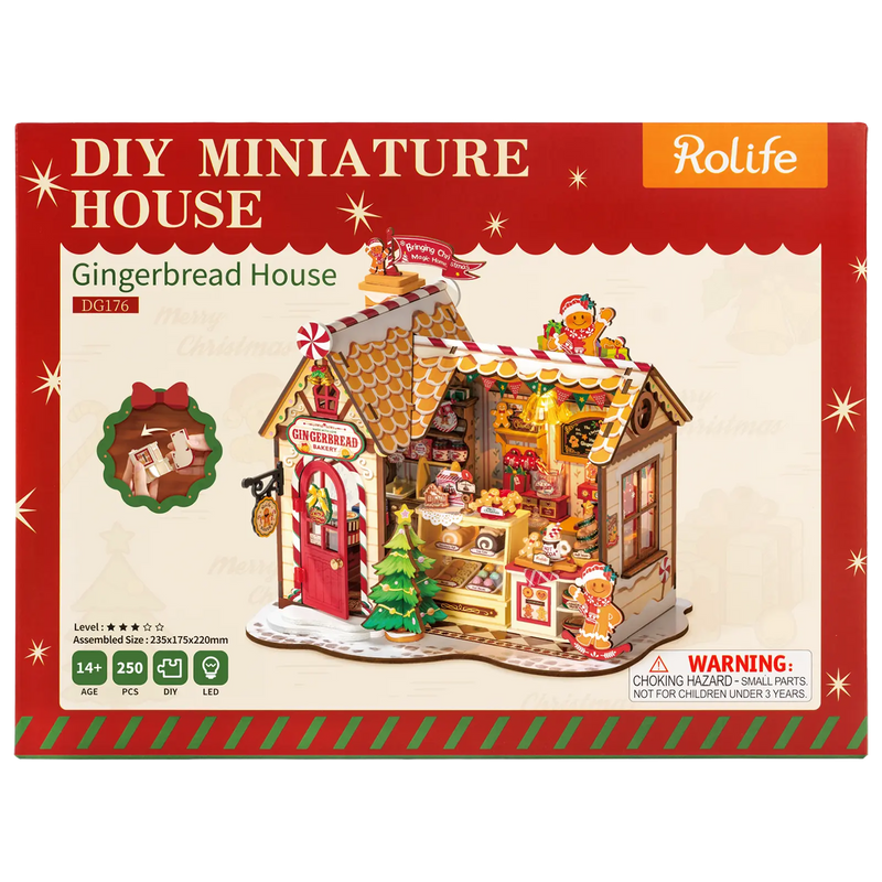 Front of package of the Robotime Gingerbread House, miniature house of a gingerbread house in Christmas theme
