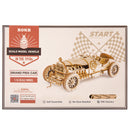 Front of package of the Robotime Grand Prix Car, wooden construction kit of a vintage racing car with open roof