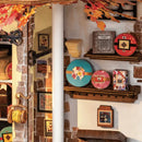 Decorations on the shelves and on the wall at Robotime Henry's Chocolate