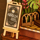 The standing chalkboard in front of the Robotime Holiday Café