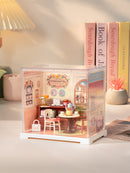 Atmospheric presentation of the Robotime Honey Tea Lounge, plastic miniature tea lounge in a small display case