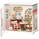 Product photo of the Robotime Honey Tea Lounge, plastic miniature tea lounge in a small display case