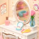 Close-up of the white makeup table from the Robotime Lovely Pink Bedroom