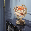 Atmospheric photo of the Robotime Luminous Globe in a luxurious room