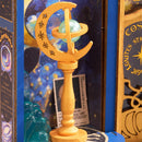 Globe on a stand in the window display of the Robotime Magic Astronomy Shop