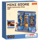 Front of package of the Robotime Magic Astronomy Shop, construction kit for a miniature house of an astronomy shop