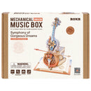 Front of package of the Robotime Magic Cello - Symphony of Gorgeous Dreams, wooden music box construction set of a moving, colored cello