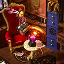 Cabinets, chair with magical book and table with crystal bal in the Robotime Magic Fantasy Corner