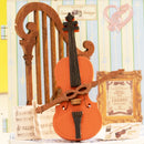 Cello and harp in the shop window of the Robotime Melody Instrument Shop