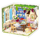 Product photo of the Robotime Midsummer Dream Yard, plastic miniature terrace with set table, pergola, and furniture