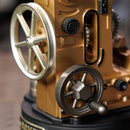 Decorative wheels on the sides of the Robotime Morse Telegraph