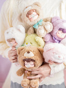 A person carrying multiple color variants of the Robotime Nanci Colorful Chocolate Cutie Bears, blind box with a cute figurine in a bear suit in multiple color variants