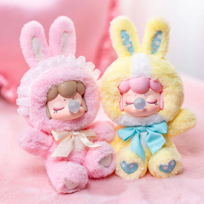 The pink and yellow color variants of the Robotime Nanci Shining Bunny, blind box with a cute figurine in a bunny suit in multiple color variants