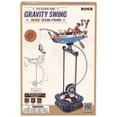 Front of package of the Robotime Ocean Fisher, wooden model kit of a rocking rowboat