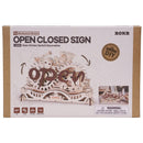 Front of package of the Robotime Open Closed Sign, wooden construction kit of a transforming sign