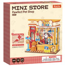 Front of package of the Robotime Pawfect Pet Shop, construction kit for a miniature house of a cute pet shop