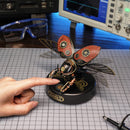 A person uses the touch button to activate the Robotime Rhinoceros Beetle