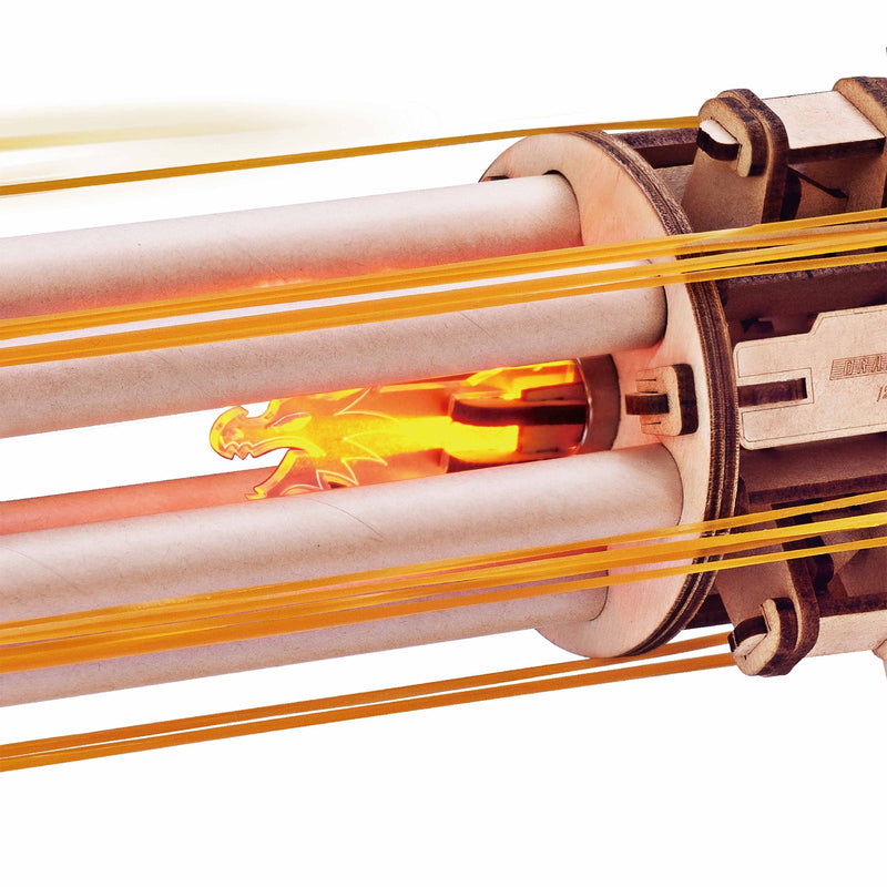 Detail of the illuminated dragon head between the barrels of the Robotime Rotating-Barrel Machine Gun