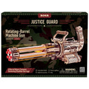 Front of package of the Robotime Rotating-Barrel Machine Gun, wooden construction kit minigun that fires rubber bands