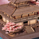 The small cherry blossom tree on the left side of the Robotime Sakura Pavilion
