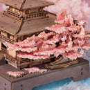 The large cherry blossom tree on the right side of the Robotime Sakura Pavilion