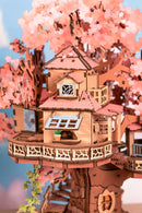 Close-up of the tree house surrounded by cherry blossoms of the Robotime Sakura Tree House