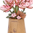 Details of the flowers, vase and small sign of the Robotime Sakura