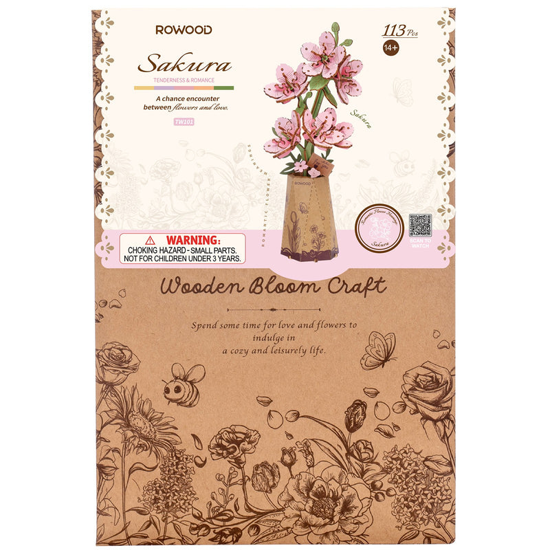 Front of package of the Robotime Sakura, wooden construction set of pink cherry blossoms