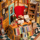 Details of the counter and cabinets full of books and the chair and ladder of the Robotime Sam’s Study